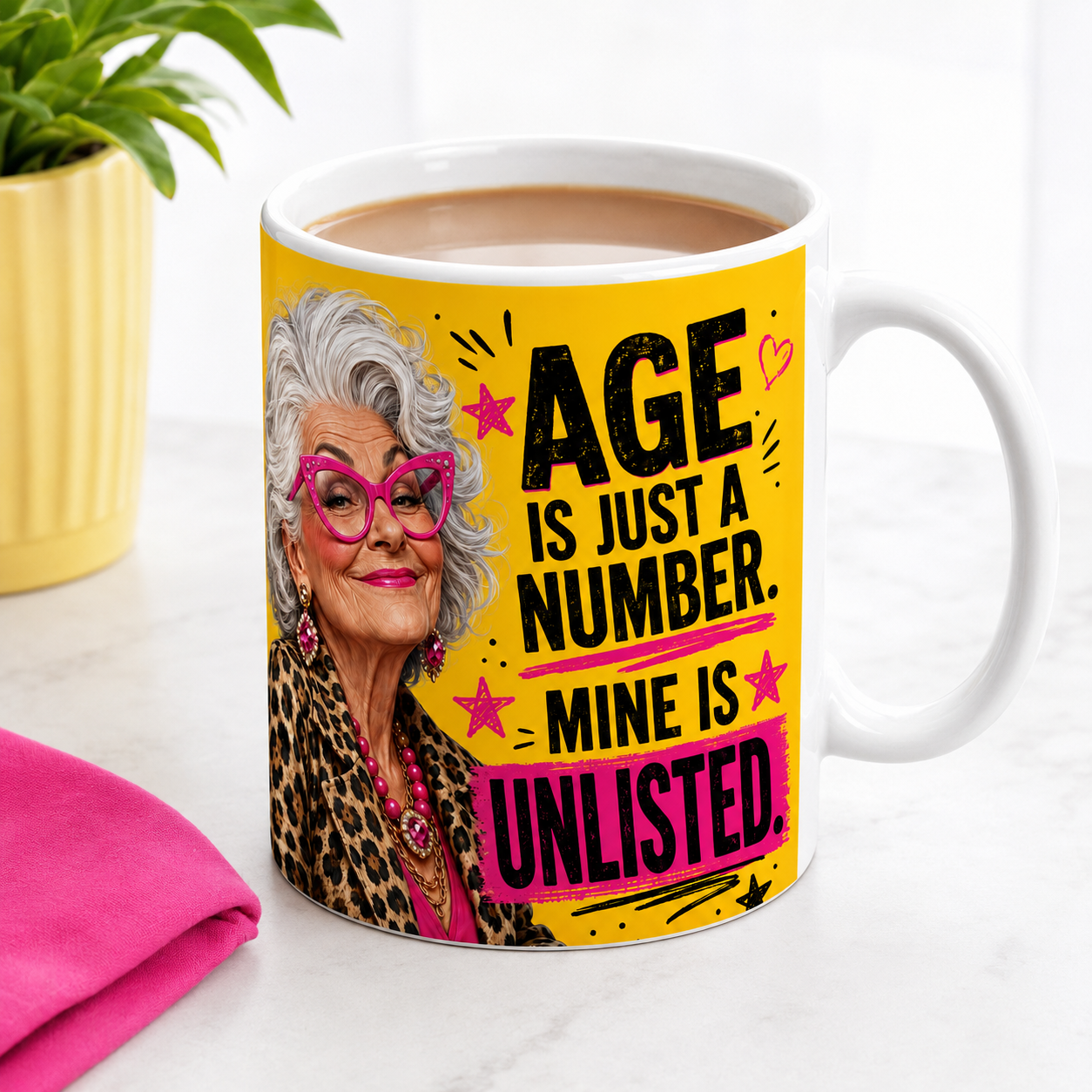 Age Is Just a Number Mine Is Unlisted funny mug filled with tea or coffee, featuring a glamorous silver-haired woman in pink glasses and leopard print.