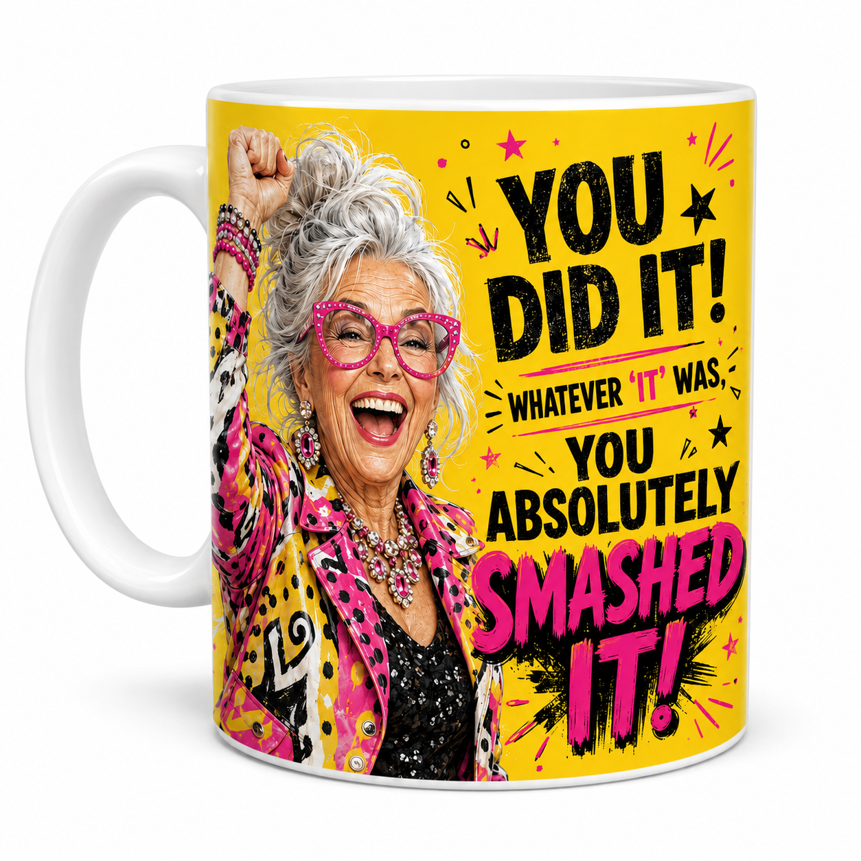 Left-handle view of the You Did It You Absolutely Smashed It celebration mug, featuring a jubilant silver-haired woman with pink glasses and colourful clothing.